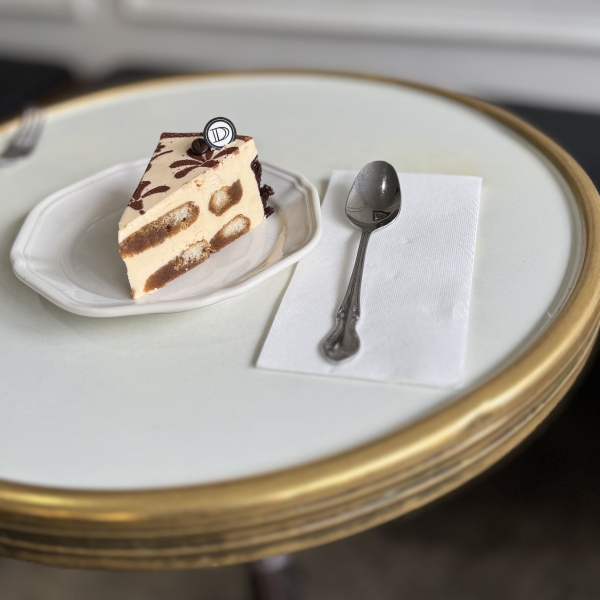 Marscapone & Marsala cream sandwiched between espresso soaked ladyfinger sponges in tempered chocolate shell